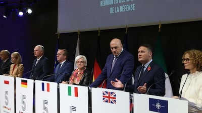Those attending the meeting of the top five defence powers, and others, in Paris on October 26. EPA