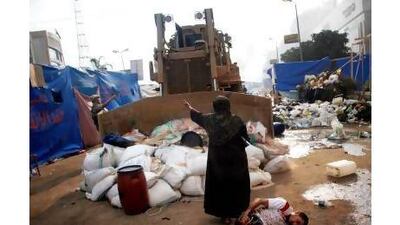 Readers deplore the violence in Egypt and ask for international intervention. Mohammed Abdel Moneim / AFP