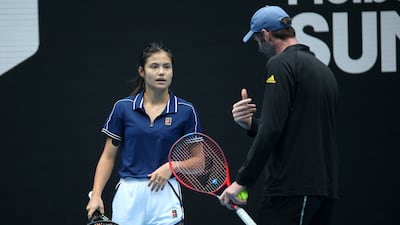 Emma Raducanu of Britain attends a practice session with support team on Margaret Court Arena. AP Photo