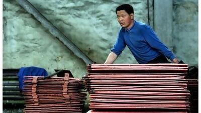 A worker at a copper smelter in China. The country is the world's biggest copper user. Natalie Behring / Bloomberg