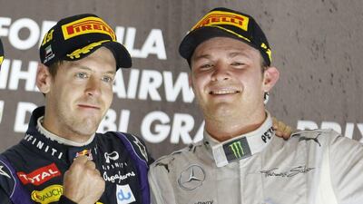 Recently minted four-time champion Sebastian Vettel is high on the skills of fellow German Nico Rosberg. Karim Sahib / AFP