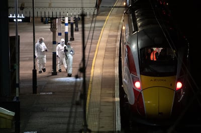 Crime scene investigators on the station platform in Huntingdon after the stabbing attack on a train, in November. Getty Images
