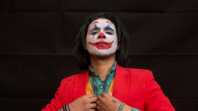 Mosa DaVinci, 25, poses for a portrait dressed as The Joker at EgyCon, an annual gathering for comic book enthusiasts, in Cairo, Egypt. AP Photo