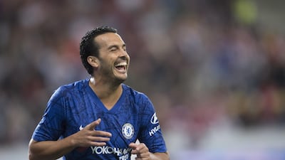Pedro celebrates scoring for Chelsea. Getty