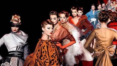 Chalhoub Group has joint ventures with prestige names such as Christian Dior. Above, models wear the brand’s spring-summer collection. AFP