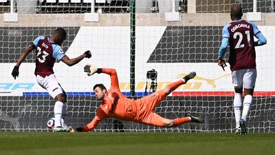 West Ham's Issa Diop, left, scores an own goal at St James' Park. AP