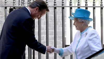 Queen Elizabeth II with Britain's then prime minister David Cameron in 2012. AP