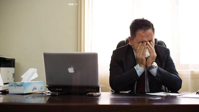 ERBIL, IRAQ: Hazhar cries over his father, a peshmerga who disappeared during the Kurdish Civil War.