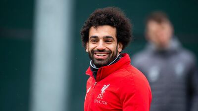 He shared a picture of his own moggies with a message supporting Egypt's strays. EPA