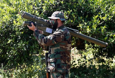 A Hezbollah fighter holding an Iranian-made anti-aircraft missile on the border with Israel during a media tour by the group on April 20, 2017. AP