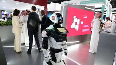 A robot does the rounds on the first day of Arab Health at the Dubai World Trade Centre. Pawan Singh / The National