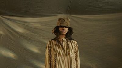 Tent stripes at the Qasimi spring / summer 2021 show. Courtesy Qasimi