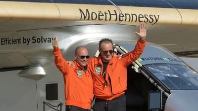 Swiss pilot Andre Borschberg, right, is welcomed by co-pilot and co-founder Bertrand Piccard after landing Solar Impulse 2 at Cairo International Airport. Khaled Desouki / AFP