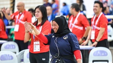Mariam Al Ali is delighted with her score during the Special Olympics UAE Games bowling held at Zayed Sports City, Abu Dhabi. Victor Besa / The National