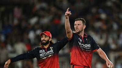 Royal Challengers Bengaluru's Josh Hazlewood, right, picked up two wickets in the final. AFP