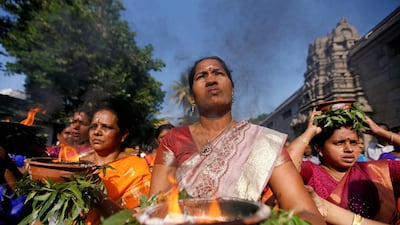 Hindu devotees pray during the annual Theru festival in Colombo, Sri Lanka. Dinuka Liyanawatte / Reuters