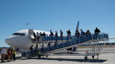 Passengers board Avelo Airlines' first flight. Bloomberg