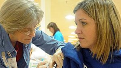 A pregnant woman receives an H1N1 vaccine in the US. The UAE is now in the final stages of preparing its vaccination programme.