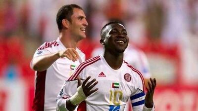 Al Jazira’s Ibrahim Diaky, right, celebrates his goal against Al Rayyan during an Asian Champions League win on Tuesday.
