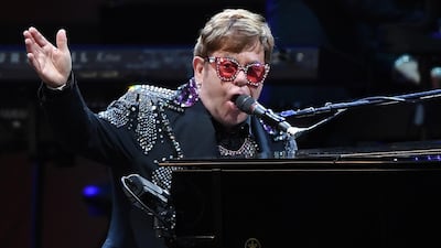 Sir Elton John becomes part of part of the Order of the Companions of Honour group. EPA