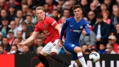 Chelsea's Mason Mount takes on Scott McTominay. AFP