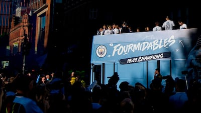 Manchester City's players react on top of the bus during the Champions Parade, Manchester, Britain. EPA