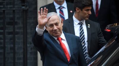 Benjamin Netanyahu waves to the press before a meeting at No 10 Downing Street in September 2019. Getty Images