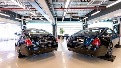 A pair of Black Badge models show off their rear ends. Courtesy Abu Dhabi Motors