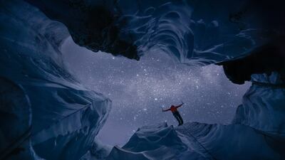 Virgil Reglioni from Norway won the gold in the People and Nature category. Reglioi took this picture inside a glacier in Solheimajokull, South Iceland