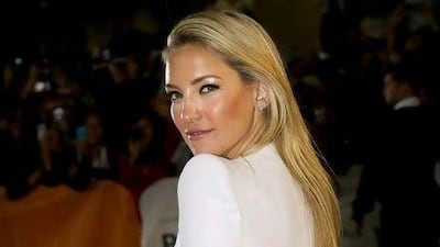 Actress Kate Hudson poses for a photograph on the red carpet at the gala for the new movie " The Reluctant Fundamentalist" during the 37th annual Toronto International Film Festival in Toronto on Saturday, Sept. 8, 2012. (AP Photo/The Canadian Press, Nathan Denette) *** Local Caption *** Toronto Film Festival Silver Linings Playbook Premiere.JPEG-0ed17.jpg