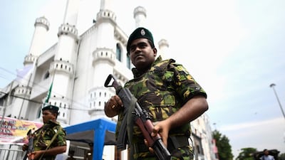Sri Lankan soldiers stand guard outside a mosque in Colombo on April 26, 2019. AFP