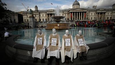 Extinction Rebellion climate change protesters demonstrate during a rally in Trafalgar Square despite a police ban. AP
