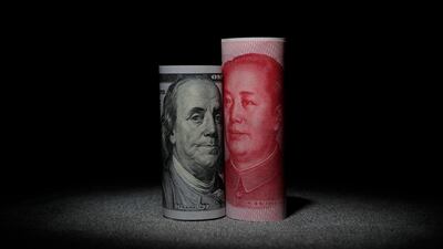 A $100 note aside a Chinese 100 yuan note. US and China trade representatives are expected to sign a phase one deal in Washington on Wednesday. Photo: EPA