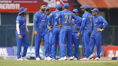 UAE pacer Junaid Siddique, second left, picked up six wickets against Oman in their CWCL2 match in Nepal. Photo: UAE Cricket / X
