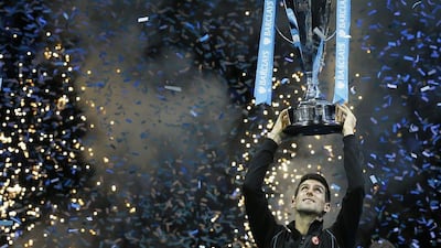 Novak Djokovic concluded 2013 with an ATP World Tour Finals victory that extended his winning streak to 22 matches. Kristy Wigglesworth / AP
