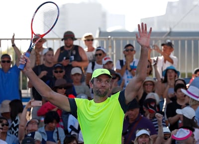 Croatia's Ivo Karlovic celebrates after beating Japan's Yuichi Sugita during their second round match at the Australian Open. Ng Han Guan / AP Photo