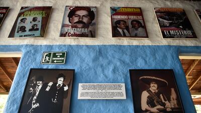 View of photographs of late drug kingpin Pablo Escobar at the Hacienda Napoles theme park. AFP