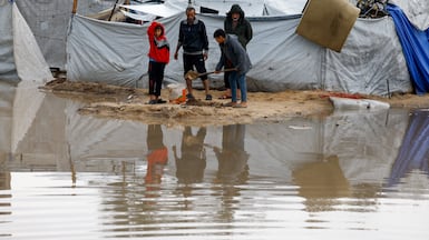 Displaced Palestinians contend with heavy rain in Nuseirat, central Gaza. Reuters