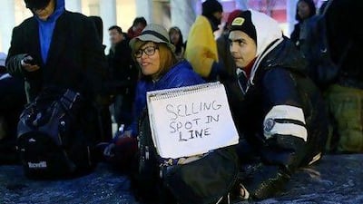 Securing a spot for an individual in a queue has become a profession in the US.Spencer Platt / Getty Images / AFP