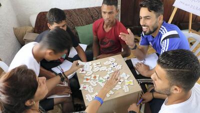 Another Syrian expatriate teaches the boys how to speak Portuguese in Brazil. Courtesy The Black Pearls Academy
