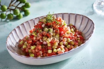 Salad shirazi is a finely diced mix of cucumber, tomato and onion dressed with lemon. Photo: Ariana's Persian Kitchen