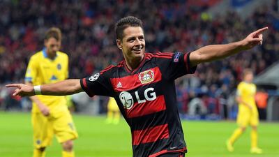 Bayer Leverkusen's Javier Hernandez celebrates after scoring the third goal in their 4-1 Champions League win over Bate Borisov on Wednesday. Federico Gambarini / EPA