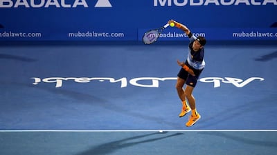 Milos Raonic unleashes one of his trademark serves against Rafael Nadal in the final of the Mubadala World Tennis Championship. Ali Haider / EPA