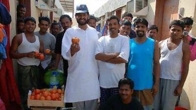 Men at an abandoned labour camp show their gratitude after receiving food donations from Adopt-A-Camp, which is gearing up for one of its busiest periods this year.