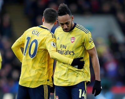 Arsenal's Pierre-Emerick Aubameyang, right, and Mesut Ozil. Reuters