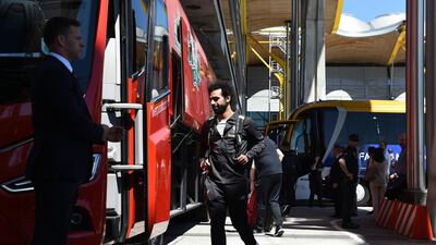 Mohamed Salah prepares to get on Liverpool's team bus after arriving in Madrid. PA Photo