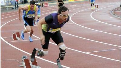 As Oscar Pistorius is in training for London 2012. Though he cannot ride his bikes, he takes great pleasure in displaying them in his home. AP Photo