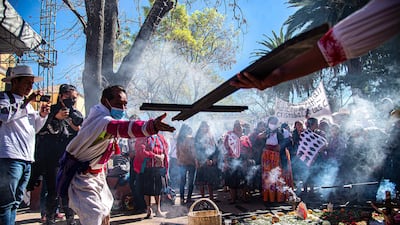 Indigenous people make an offering to mark the 11th anniversary of the death of Bishop Samuel Ruiz, in Chiapas, Mexico. EPA