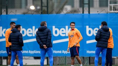 Spanish defender Eric Garcia (C) and teammates take part in a training session in Barcelona on March 19, 2022, on the eve of the Spanish League. AFP