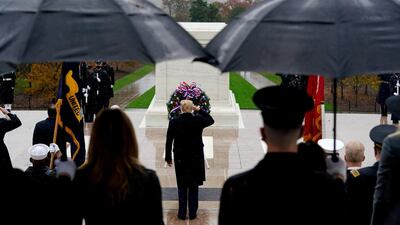 President Donald Trump participates in a wreath laying ceremony on Veterans Day at Arlington National Cemetery in Arlington. AP